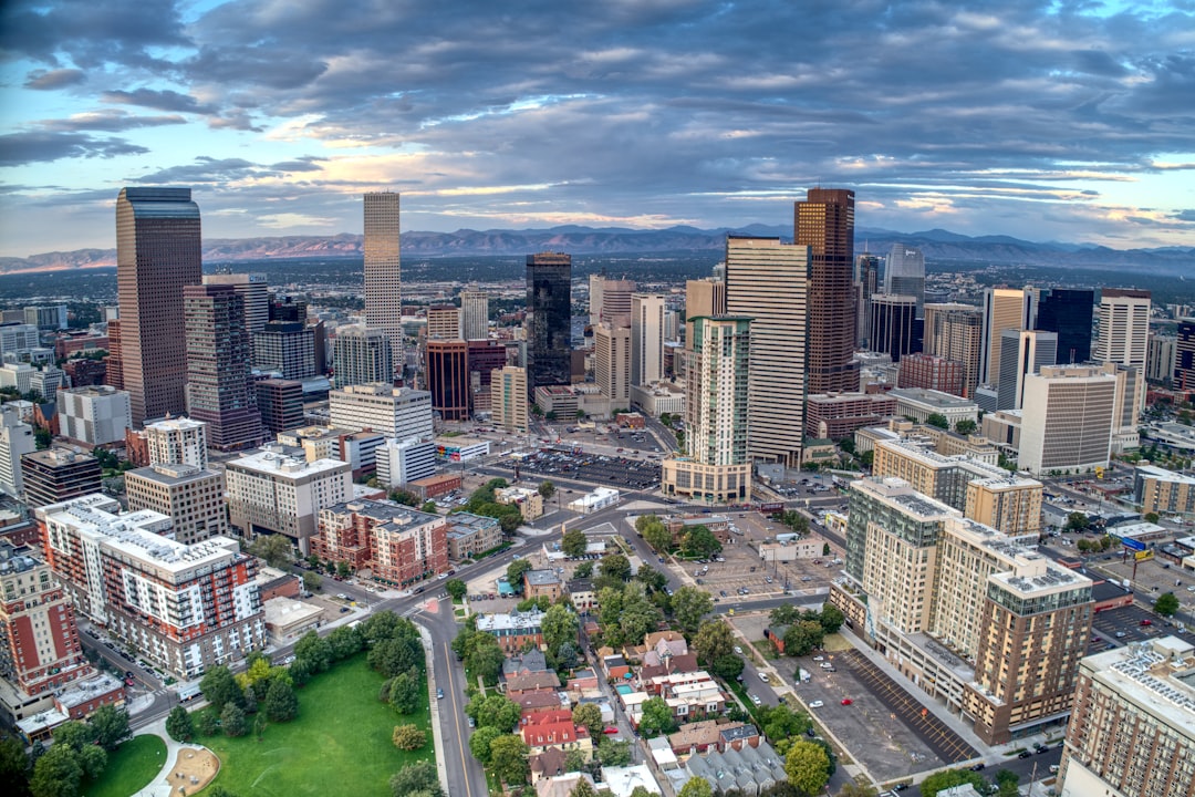 Daybreak over downtown Denver with a view of the Rocky Mountains to the west